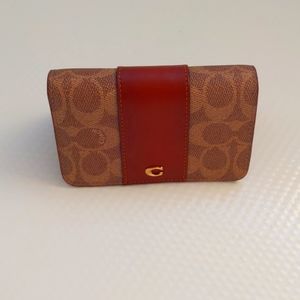 COACH signature small wallet in rust tan with Brass zipper and emblem